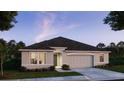 Charming single-story home featuring a well-manicured lawn and attached two-car garage at 25138 Calusa Dr, Punta Gorda, FL 33955