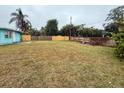 A large yard with a new fence at 2155 Webber St, Sarasota, FL 34239
