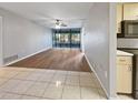View of an empty living room featuring neutral colors and a ceiling fan at 612 Bird Bay S Dr # 113, Venice, FL 34285