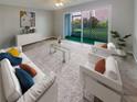 Bright living room with modern furniture, neutral tones, and a screened patio at 3425 41St S Ter # 202, St Petersburg, FL 33711