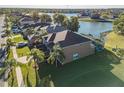 Beautiful home with an attached garage and screened in patio on a waterfront lot at 31028 Baclan Dr, Wesley Chapel, FL 33545