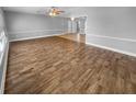 Spacious living area with wood-look floors and ample room for entertaining at 1848 Redcoat Ln, Clearwater, FL 33764