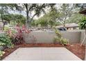 Private patio space with nice hardscape, colorful plants, and serene outdoor ambiance at 6262 142Nd N Ave # 1203, Clearwater, FL 33760