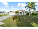 Charming single-story home with a manicured lawn and inviting curb appeal at 4320 Genesee Ln, New Port Richey, FL 34655