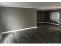 Large living room with neutral decor features modern vinyl floors at 125 Dolphin S Dr, Oldsmar, FL 34677