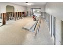 Large living room ready for renovation with an open floor plan with terrazzo floors at 2826 46Th S St, Gulfport, FL 33711