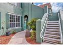 Multi-Gathering home featuring manicured landscaping, sidewalks, and a private entrance at 10520 Windsor Lake Ct # 10520, Tampa, FL 33626