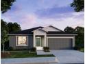 Charming single-story home featuring a gray exterior, well-manicured lawn, and a two-car garage at 25290 Puerta Dr, Punta Gorda, FL 33955