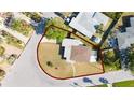 Expansive lot with mature trees in a tranquil neighborhood at 520 Baywood S Dr, Dunedin, FL 34698