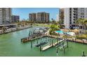 Waterfront condos with private docks, boat lifts, and a community pool, offering a luxurious coastal living experience at 1581 Gulf Blvd # 102N, Clearwater Beach, FL 33767
