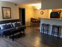 Open-concept living space with kitchen and dining area at 8653 Fancy Finch Dr # 102, Tampa, FL 33614