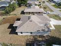 Home back view, featuring a new roof and proximity to other residential properties at 3105 Lockwood St, Port Charlotte, FL 33952
