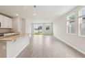 Bright and airy living space with sliding doors to the backyard and view of the water at 2320 E Newsome Rd, Plant City, FL 33565