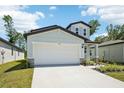 Charming single-Gathering home boasting a two-car garage and beautifully landscaped front yard at 3904 Radiant Mountain Dr, Plant City, FL 33565