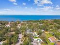 Stunning aerial view capturing a neighborhood near a waterfront, showcasing the beautiful location at 913 Tennessee Ln, Sarasota, FL 34234