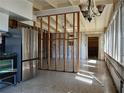 Open kitchen featuring a stainless steel refrigerator and modern lighting at 316 Country Club Dr, Oldsmar, FL 34677