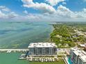 Condo building near the water surrounded by a marina, and beautiful scenery at 920 N Osceola Ave # 803, Clearwater, FL 33755