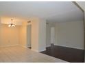Spacious living area with tile and wood flooring at 4826 Marine Pkwy # 202, New Port Richey, FL 34652