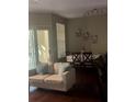 Living room showing open floor plan to dining room at 5125 Palm Springs Blvd # 13107, Tampa, FL 33647