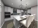 Modern kitchen features white cabinets, stainless steel appliances, an island with marble countertop and pendant lighting at 461 Sun Chaser Dr, Nokomis, FL 34275