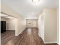 Open-concept living room boasts new floors, neutral paint, and natural light at 626 Belleview Blvd, Clearwater, FL 33756