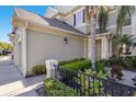 Close-up of a charming home exterior with manicured landscaping and architectural details at 8035 St Simons St # 8035, University Park, FL 34201
