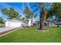 Charming single-story house boasts a well-maintained lawn and a two-car garage at 10237 Bannock St, Spring Hill, FL 34608