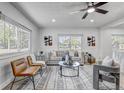 Bright living room featuring modern furniture, neutral decor, and ample natural light at 1807 49Th W Ave, Bradenton, FL 34207