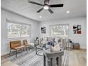 Bright living room featuring modern furniture, neutral decor, and ample natural light at 1807 49Th W Ave, Bradenton, FL 34207