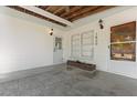 Front porch with decorative brick planter and exterior lighting at 1820 Marvy Ave, Tampa, FL 33612