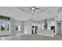 Bright and airy living room boasting contemporary design and an abundance of natural light at 211 Rotonda S Blvd, Rotonda West, FL 33947