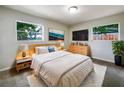Serene bedroom with natural light, stylish decor, and cozy furnishings at 1207 Lorie Cir, Brandon, FL 33510