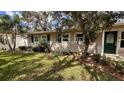 Charming home exterior with manicured landscaping and a cozy, inviting curb appeal at 3141 Irving St, Sarasota, FL 34237
