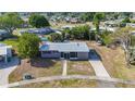 A nice aerial view shows this charming single-story home in a tranquil residential neighborhood at 22131 Bahama Ave, Port Charlotte, FL 33952