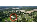 An aerial view of the surrounding neighborhood and the house at 5213 Keene Dr, Plant City, FL 33566