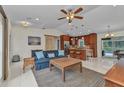 Open-concept living space with kitchen, living room, and dining area at 5404 Carso Ter, North Port, FL 34286