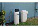 Exterior featuring a modern water filtration system for the home at 32618 Rapids Loop, Wesley Chapel, FL 33545