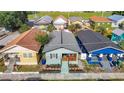 Aerial view of a charming single-story home with well-kept landscaping in a vibrant neighborhood at 2904 Sanchez St, Tampa, FL 33605