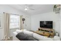 Bright living room with a large window, neutral decor, and a view of the entryway at 2356 Kingston S St, St Petersburg, FL 33711