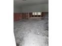Spacious living room with exposed framing, offering a blank canvas for customization and design at 7240 Donna Dr, New Port Richey, FL 34652