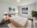 Comfortable main bedroom with a neutral palette, large window, and soft carpet at 11114 Shadybrook Dr, Tampa, FL 33625