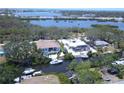Beautiful waterfront property with private dock and boat lift, situated on a serene canal at 608 Bittner Blvd, Nokomis, FL 34275