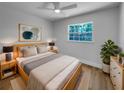 Comfortable bedroom featuring ample natural light, ceiling fan, and neutral decor at 3410 Grove Street Cir, Tampa, FL 33610