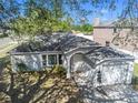 Lovely single-story home with manicured lawn, arched entry, and attached garage at 4601 Copper Ln, Plant City, FL 33566