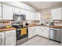 Well-lit kitchen featuring stainless steel appliances and warm butcher block countertops at 4601 Copper Ln, Plant City, FL 33566