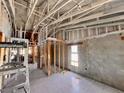 Exposed framing and block walls offer a glimpse into the construction of a new home or renovation project at 7342 Skyview Ave, New Port Richey, FL 34653
