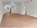 Bright living room featuring hardwood floors and neutral paint for a modern look at 404 Courtney Dr, Temple Terrace, FL 33617