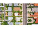 An aerial view showing the property's layout, landscaping, and proximity to nearby homes and the road at 16107 Gulf Blvd, Redington Beach, FL 33708