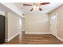 Spacious living room features new hardwood floors and a front door entry at 1020 58Th N Ave, St Petersburg, FL 33703