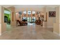 Elegant foyer with high ceilings, archways and large picture windows at 37511 Washington Loop Road, Punta Gorda, FL 33982